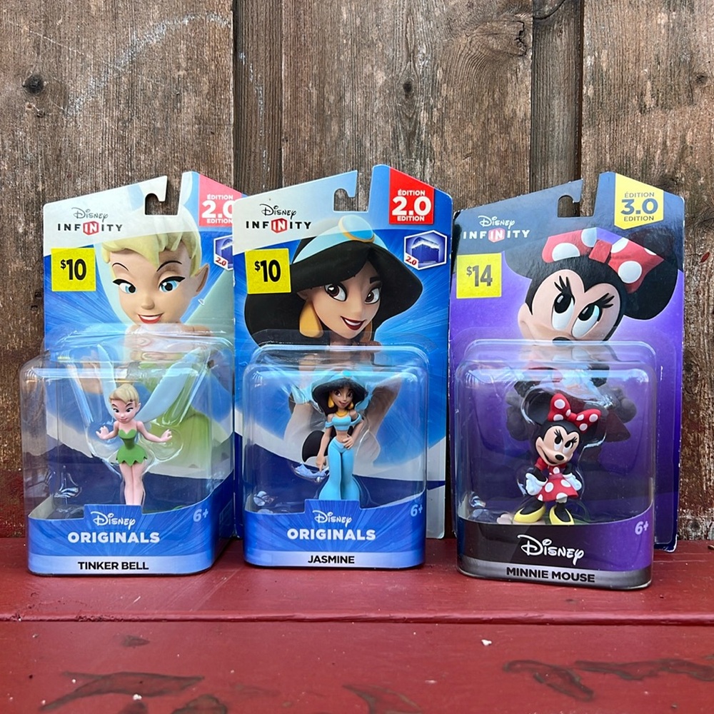 Disney Infinity Figures and Power Discs, Tinker Bell, Jasmine and Minnie Mouse.